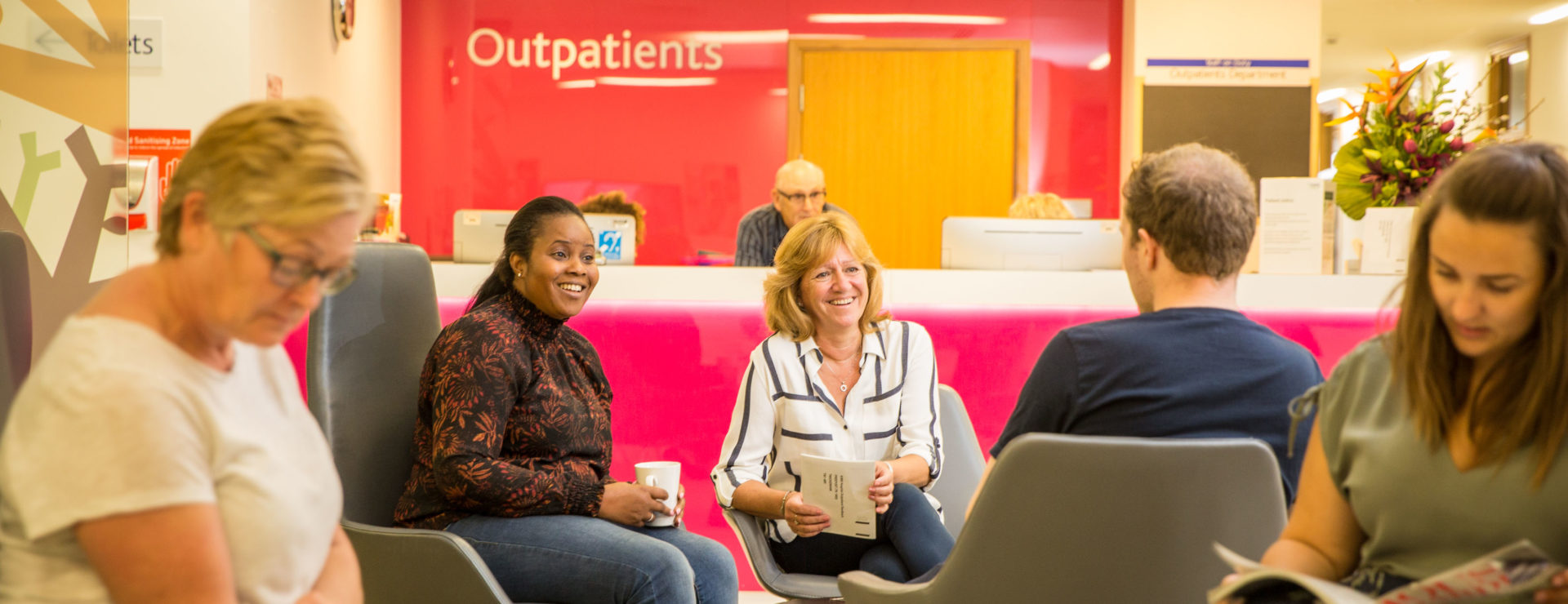 KIMS Hospital patients in outpatient waiting area.