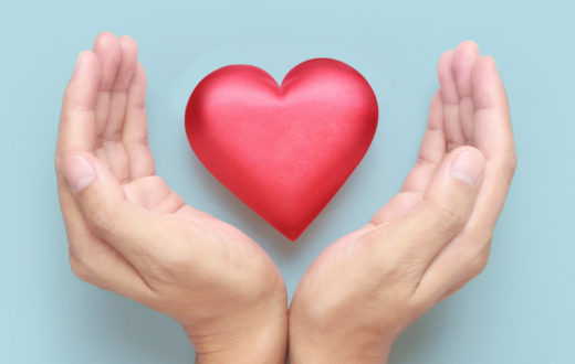 A 3d heart shown between two hands promoting how to look after your heart with diet and lifestyle tips