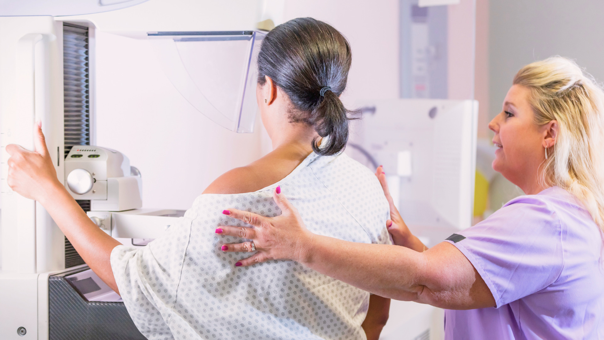 A woman having a mammogram