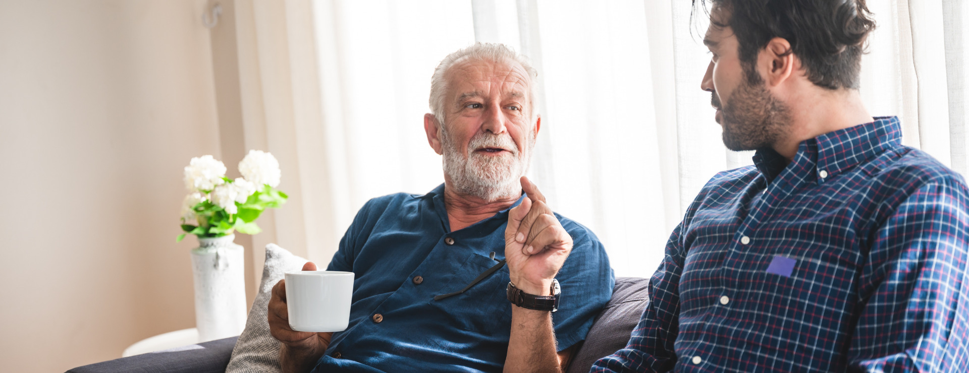 Father and Son having a cup of tea and a chat