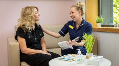 A patient being comforted by a Nurse