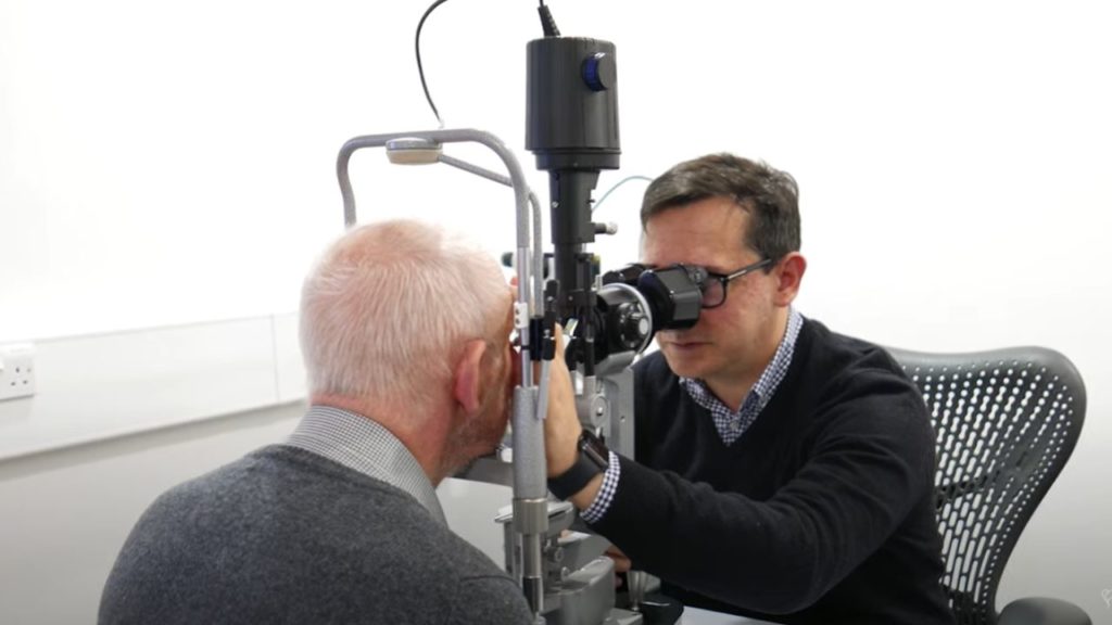 A patient having their eyes examined for cataracts surgery.