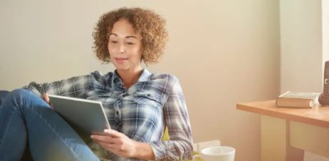 Woman booking an appointment online.