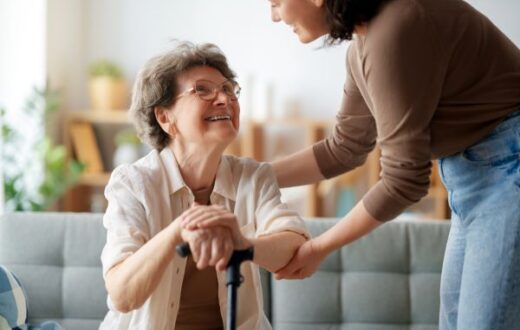 A lady feeling happy after discussing her cardiac pathway with a consultant at KIMS Hospital