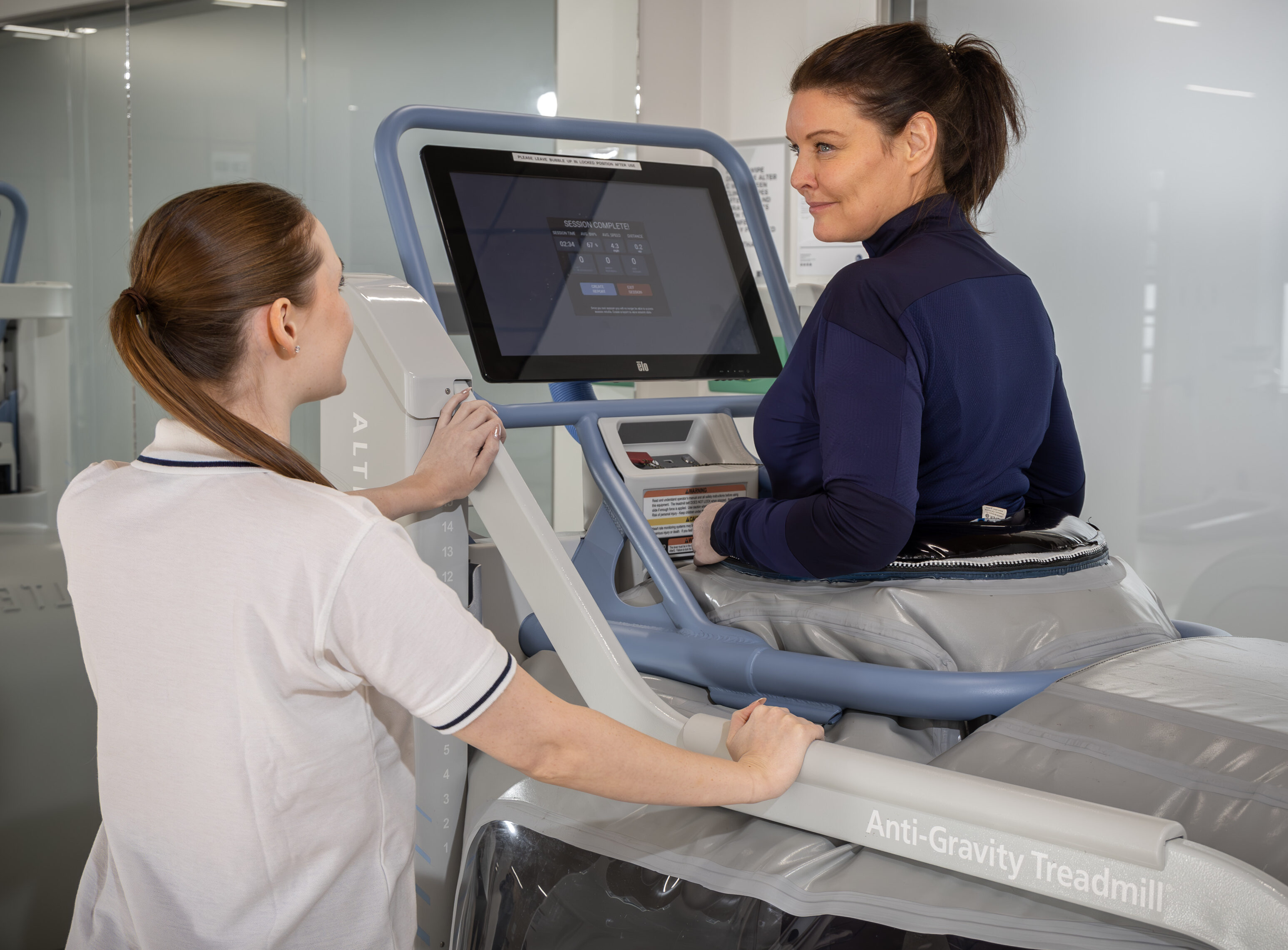 Physiotherapist giving a patient an initial assessment on the AlterG Anti-Gravity Treadmill